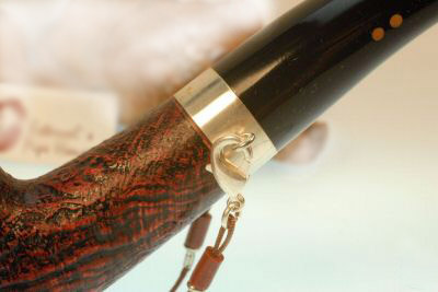 Attache par un mousqueton Attache par un mousqueton